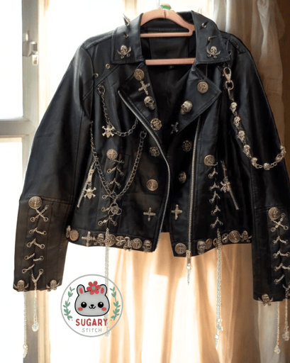 Edgy upcycled faux leather jacket with chains